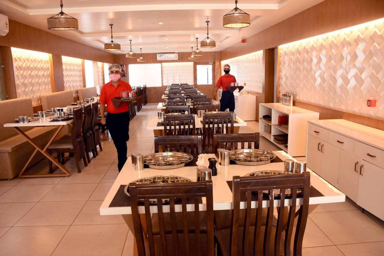 Hotel Marigold Somnath Bagian luar foto